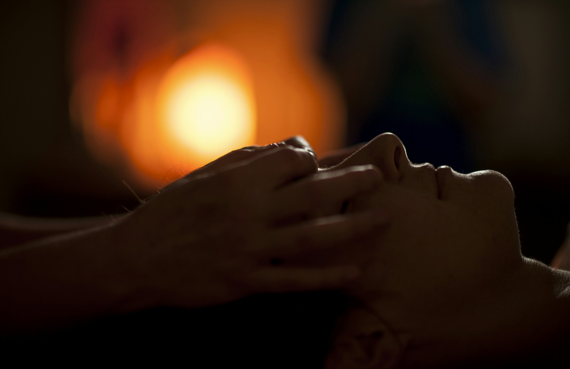 persons-hand-on-top-of-sun.jpg persons hand on top of sun